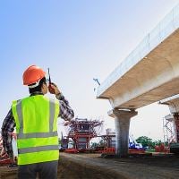 Civil engineer supervising rail construction